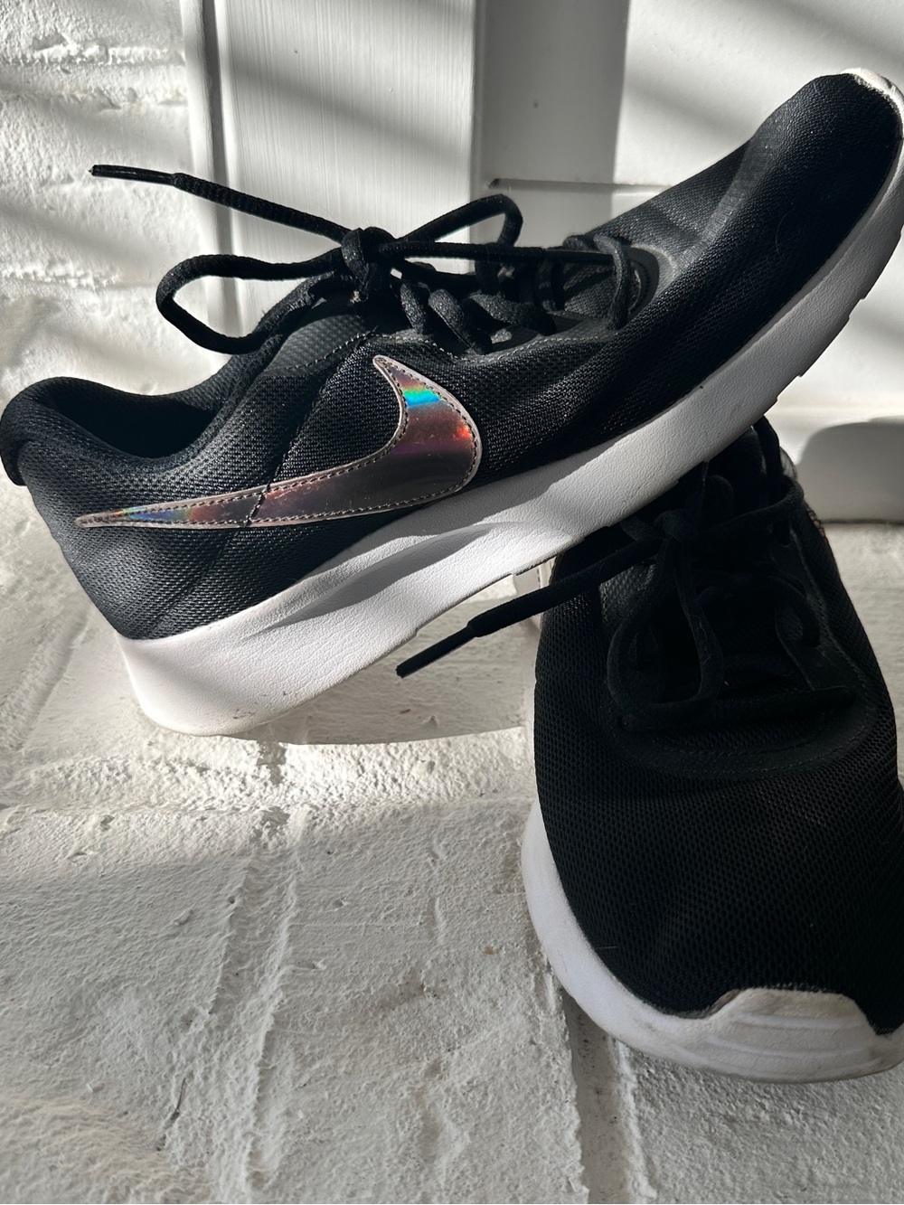 Nike Black Sneakers with Iridescent Swoosh